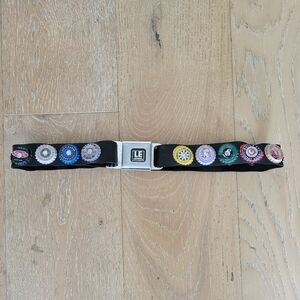 Little Earth 90’s VTG Seatbelt Bottle Cap Belt Size 32” Adjusts Stretchy